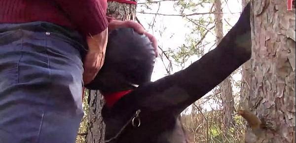  Tied to a tree on a sexy outfit, masked and outdoor deepthroat with no mercy